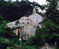 Rock-carved Standing Buddha